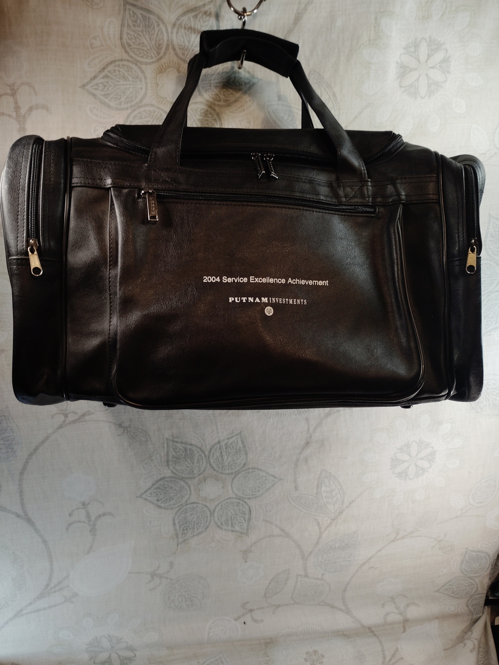 Leeds Black Faux Leather Duffel/Travel Bag w/Front & Side Zipper Pockets w/ Logo